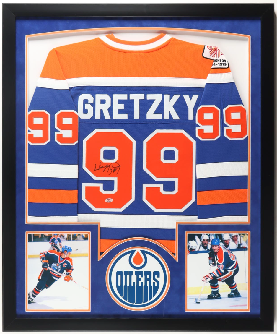 Full custom-framed Wayne Gretzky signed Edmonton Oilers No. 99 jersey display with two action photographs and Oilers logo