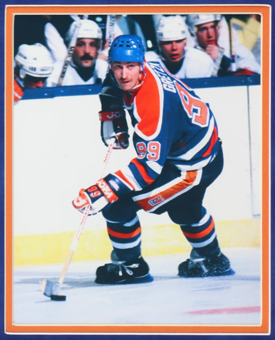 Detail of the right Wayne Gretzky action photograph in the framed display